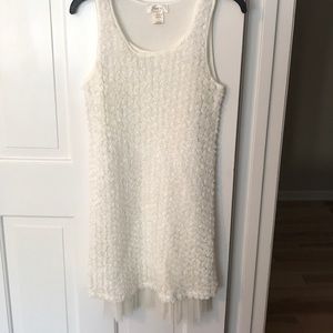 Simple white dress with textured detail